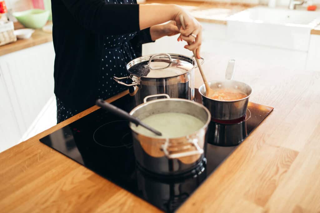 Homebuyer using an induction stove